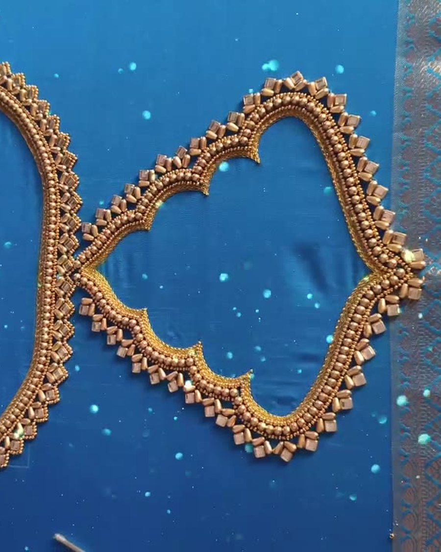 Gold kundan aari work neckline on blue silk bridal blouse matched to zari saree border, Coimbatore