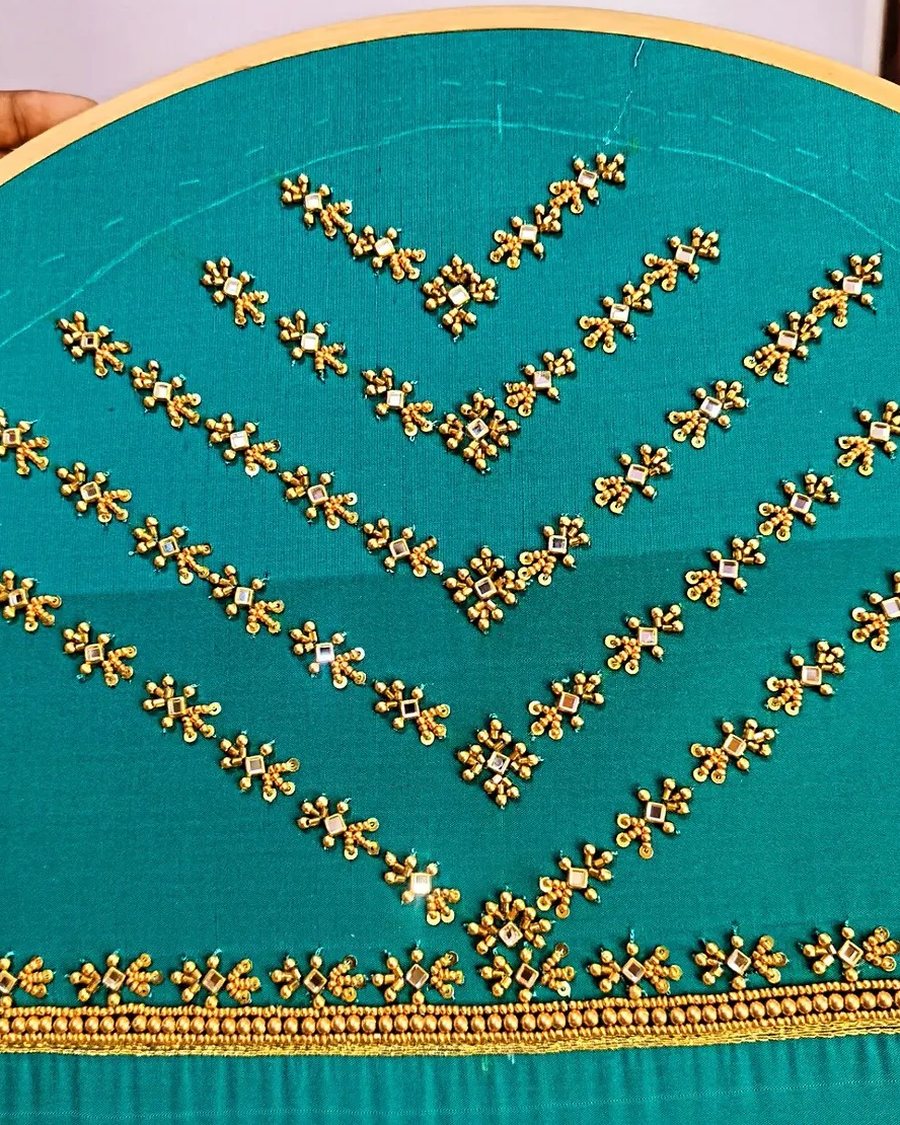 Teal silk blouse with gold bead and mirror chevron aari work on the frame, simple design, Kinathukadavu